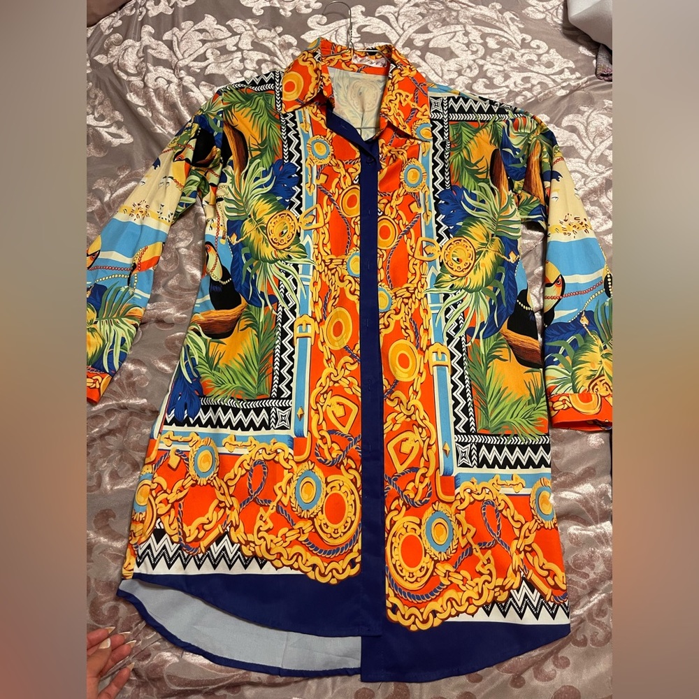 Like new, over sized dress. Color as shown on pictures